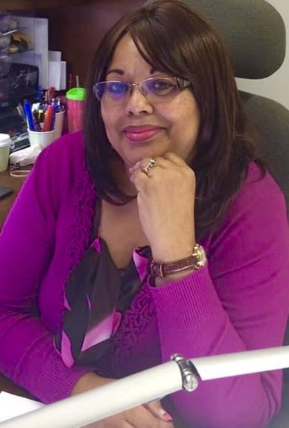 DeGeta Cole at her desk